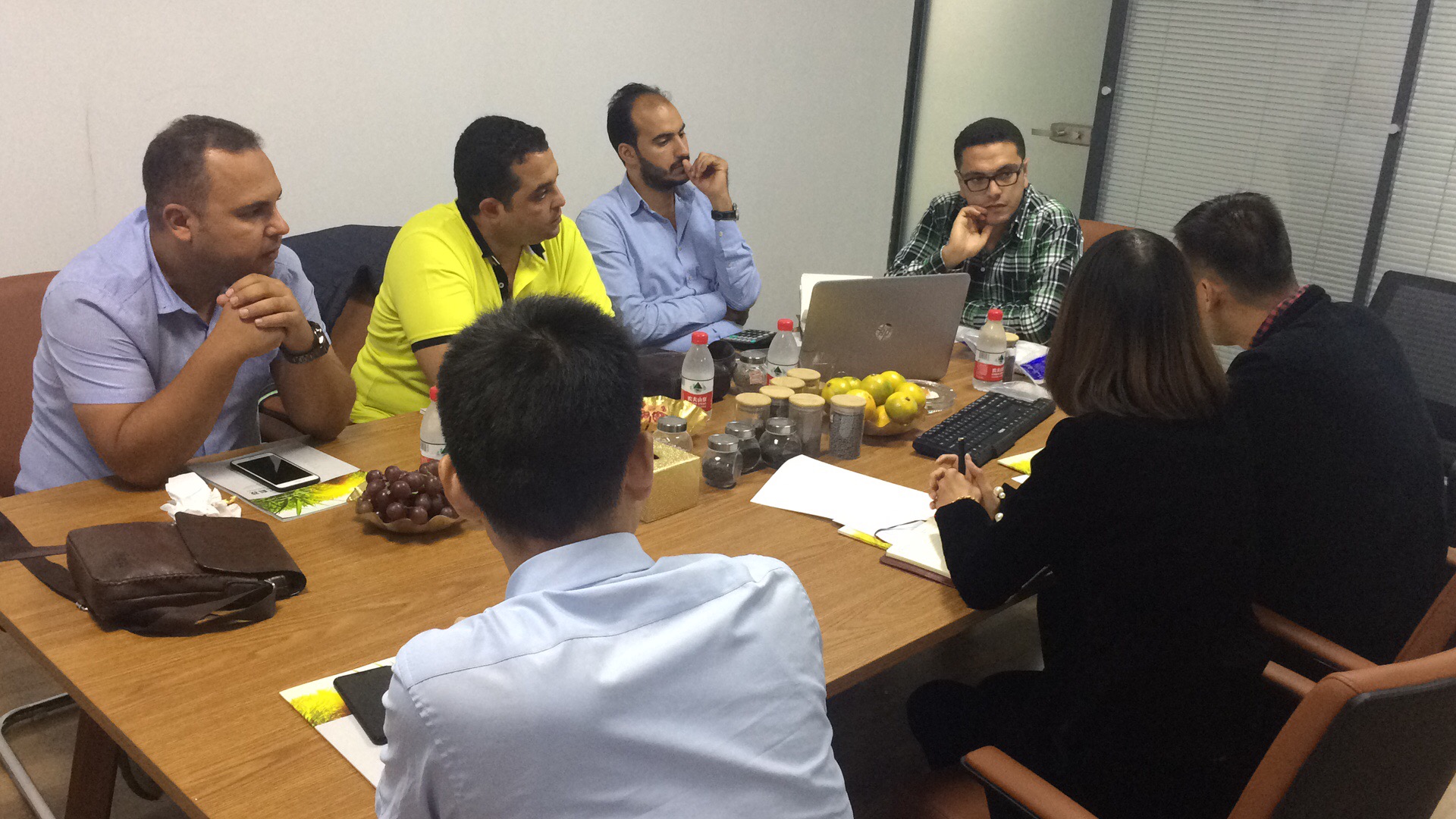 MFP staff is negotiating projects with clients in the meeting room